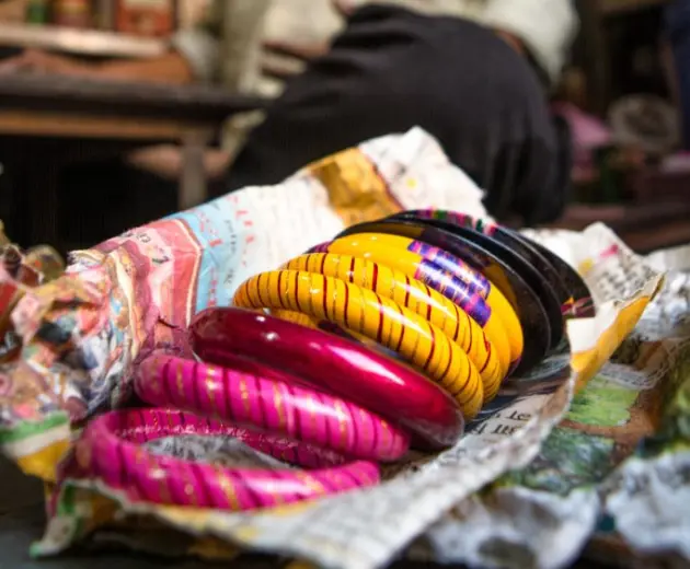 A beautifully crafted bangles displayed in a workshop, ready for sale.