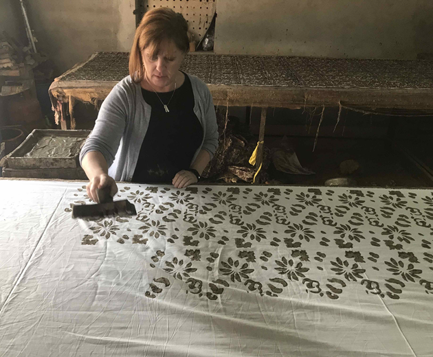 A lady doing Hand Block Printing