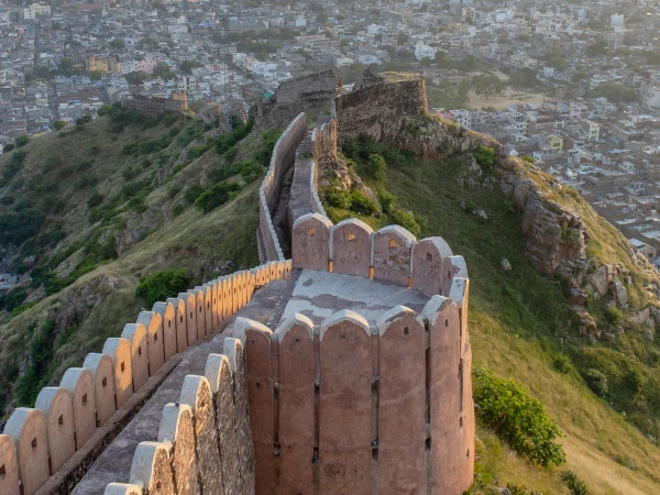 View looking down from the steep defensive walls of Nahargarh Fort onto the sprawling city of Jaipur.