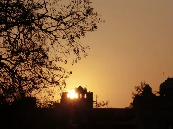 Sunset over Jaipur, silhouette of historic building, Savista Retreat.